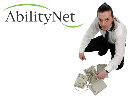 AbilityNet logo and user with broken keyboard.