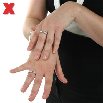 Picture - Rubbing back of right hand.