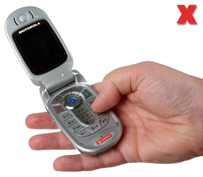Picture - Texting on a mobile phone.
