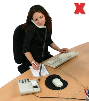 Picture - Cradling the telephone.